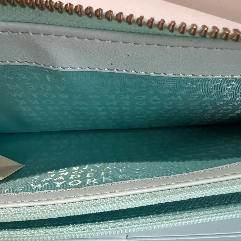 Kate Spade Graphic New Horizons Out Of Office Kaden Aqua Wallet.